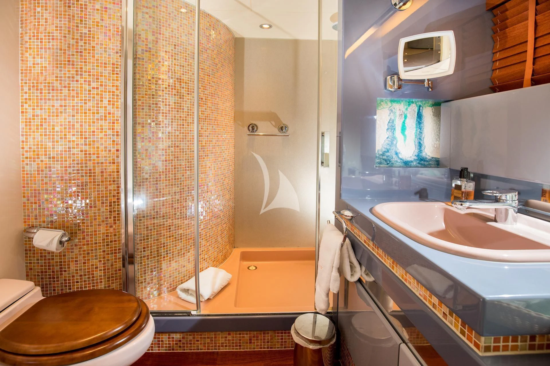 a bathroom with a glass shower aboard HEARTBEAT OF LIFE Yacht for Sale