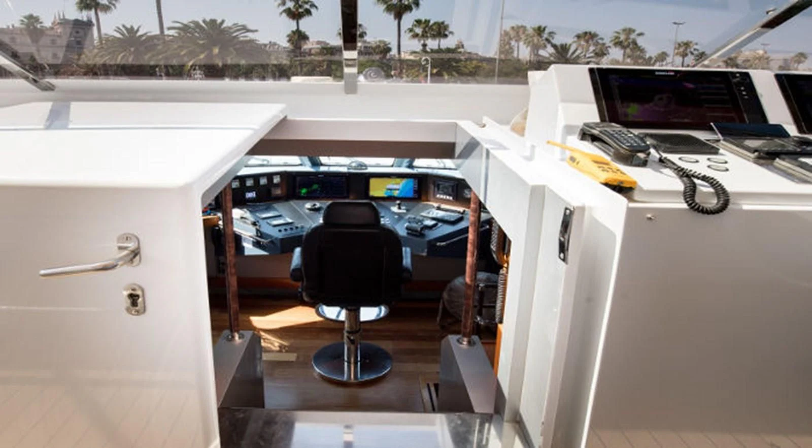 a room with a desk and a chair and a computer aboard HEARTBEAT OF LIFE Yacht for Sale