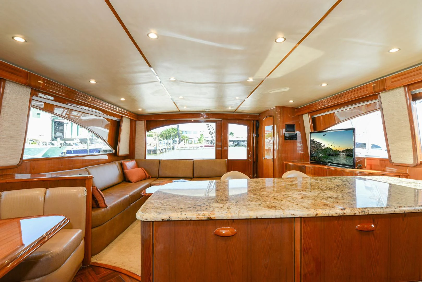 a kitchen with a large island aboard CRAZY J Yacht for Sale