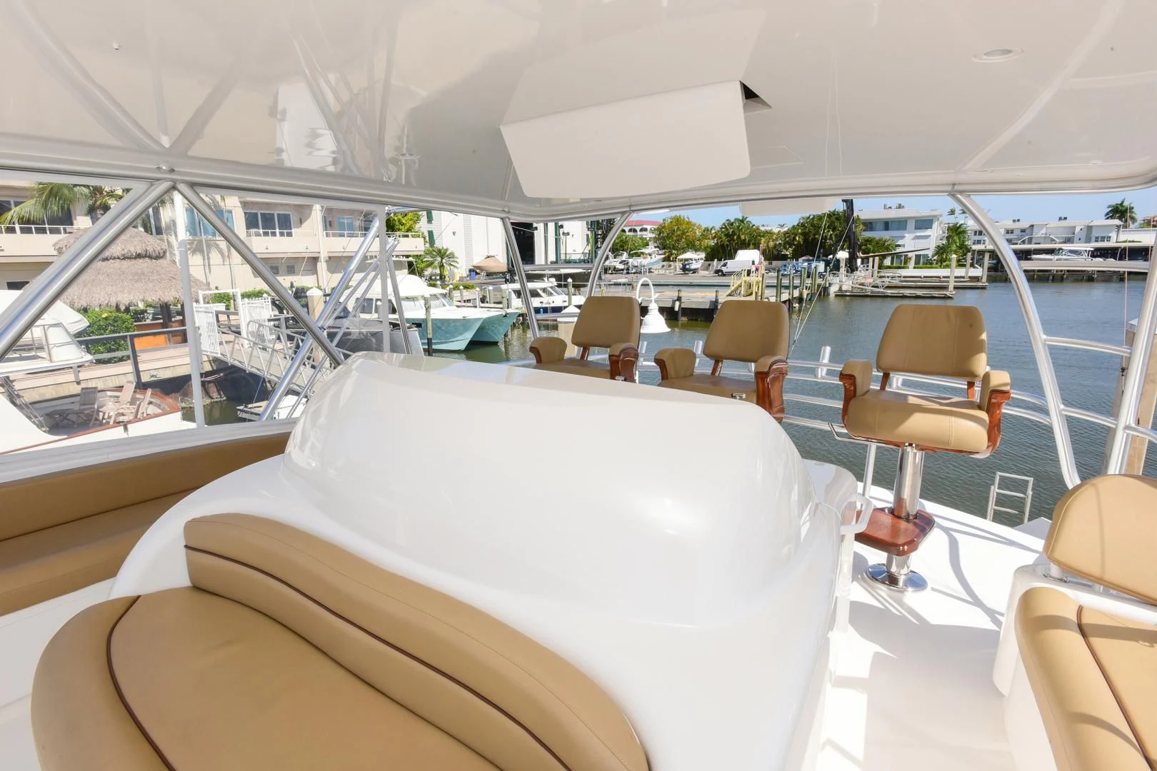 a boat with chairs and tables aboard CRAZY J Yacht for Sale