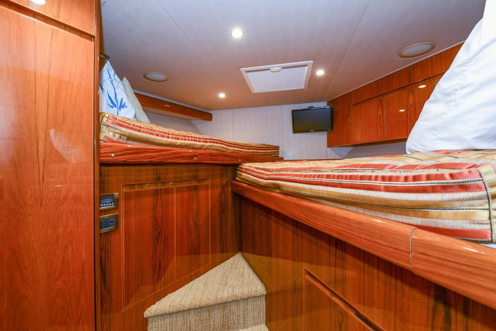 a room with bunk beds aboard CRAZY J Yacht for Sale