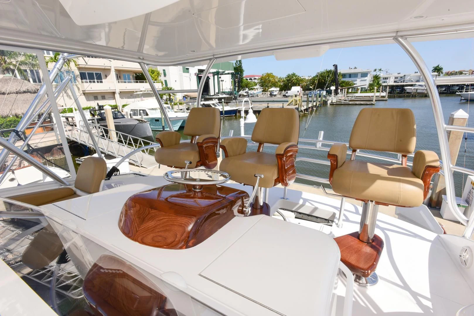 a boat with a table and chairs aboard CRAZY J Yacht for Sale
