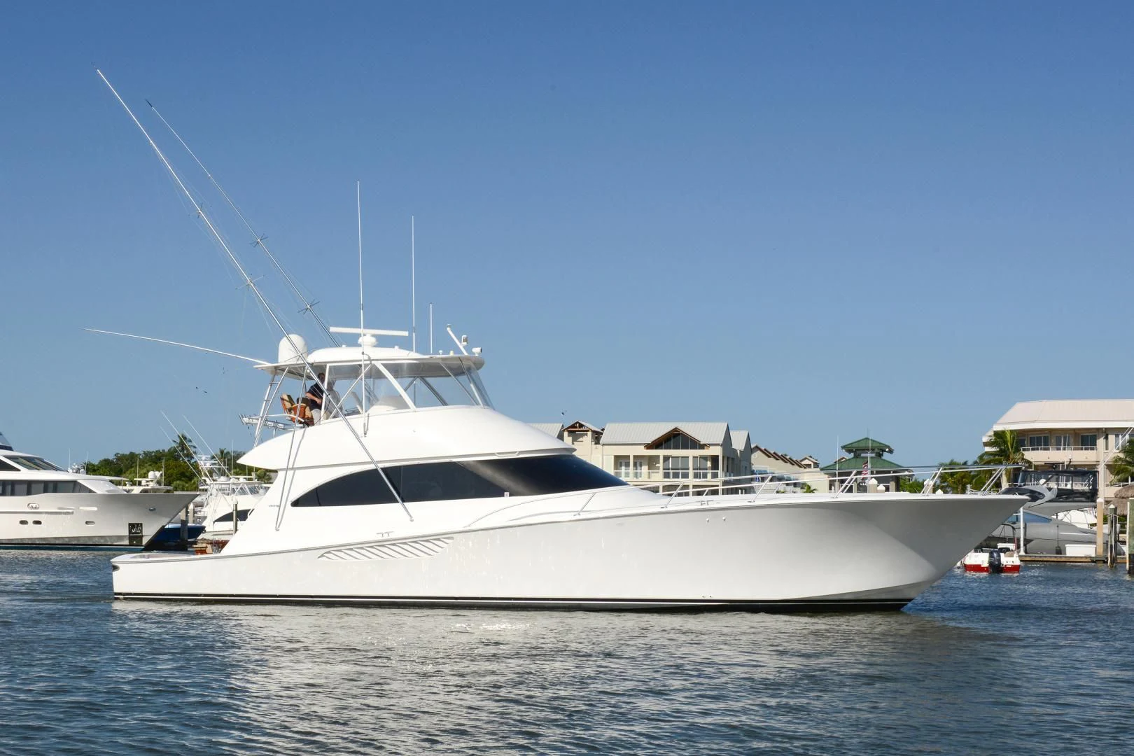 a white boat in the water aboard CRAZY J Yacht for Sale
