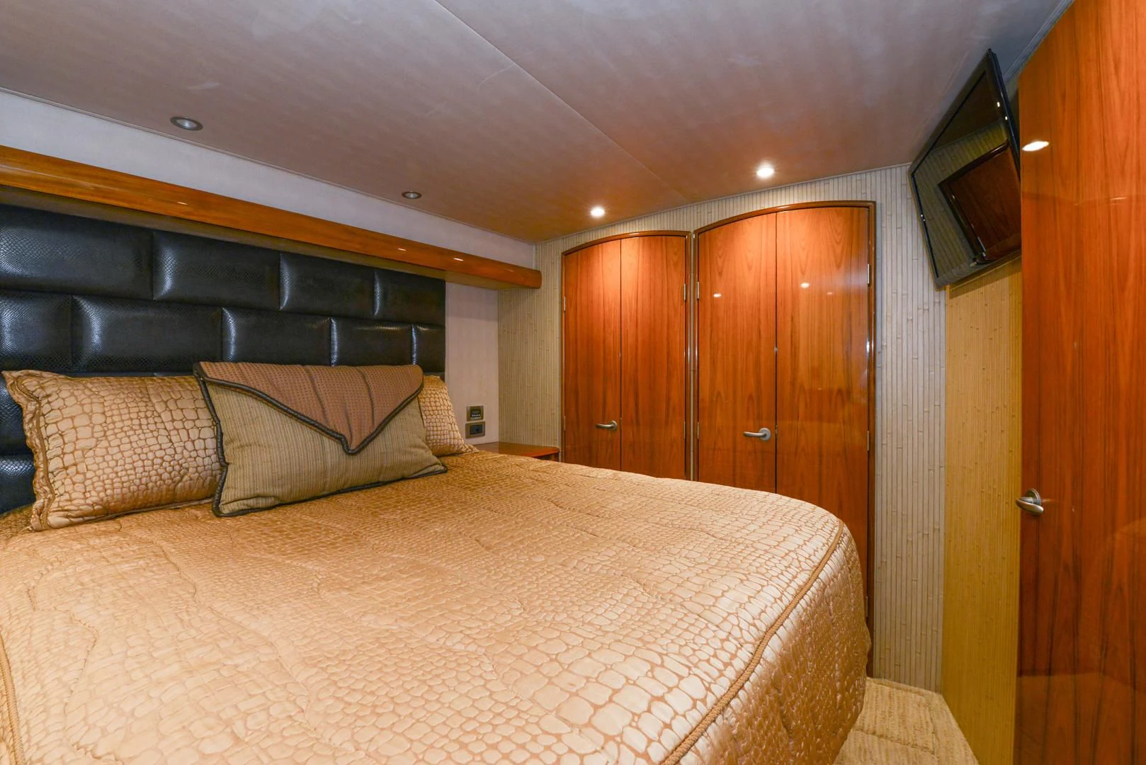 a bed in a room aboard CRAZY J Yacht for Sale