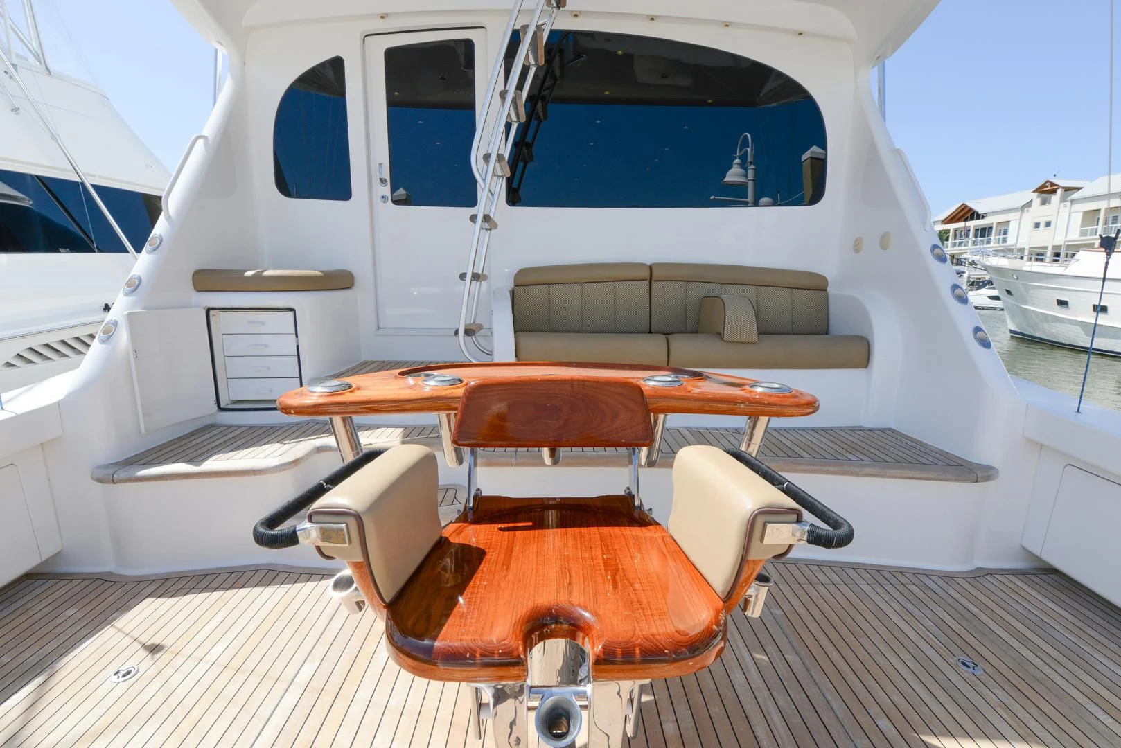 a boat with a seat aboard CRAZY J Yacht for Sale