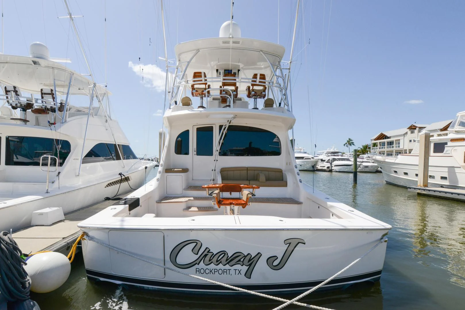 a group of boats in a harbor aboard CRAZY J Yacht for Sale