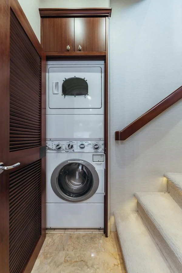a washer and dryer in a room aboard FINAL FINAL Yacht for Sale