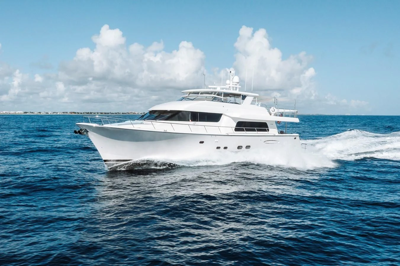 a white yacht in the water aboard FINAL FINAL Yacht for Sale