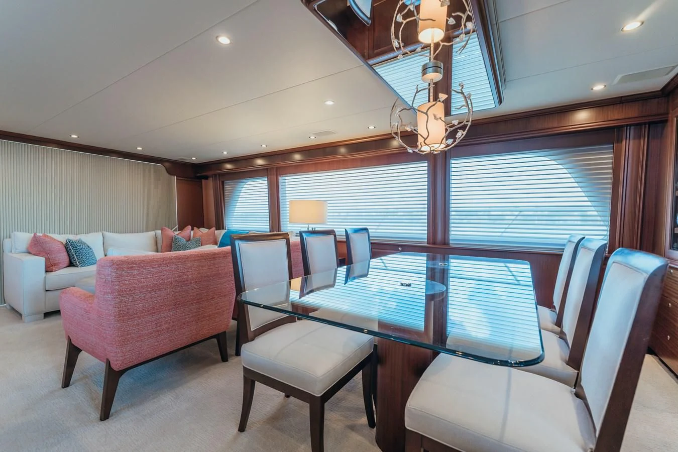 a living room with a table and chairs aboard FINAL FINAL Yacht for Sale
