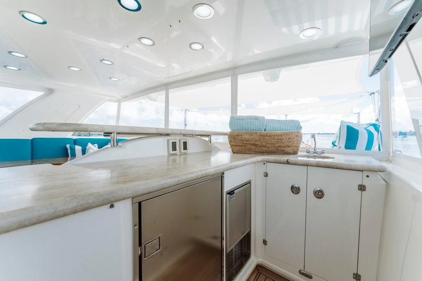a kitchen with white cabinets aboard FINAL FINAL Yacht for Sale
