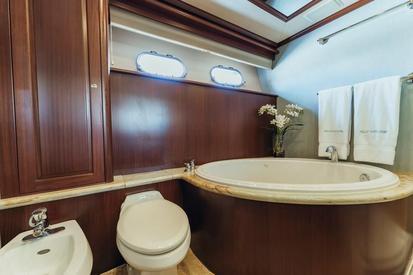 a bathroom with a sink and toilet aboard FINAL FINAL Yacht for Sale