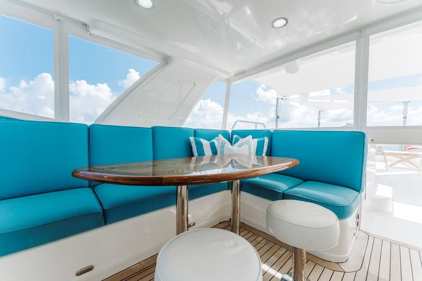 a room with a table and chairs aboard FINAL FINAL Yacht for Sale