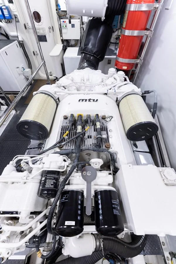 a white car engine aboard FINAL FINAL Yacht for Sale