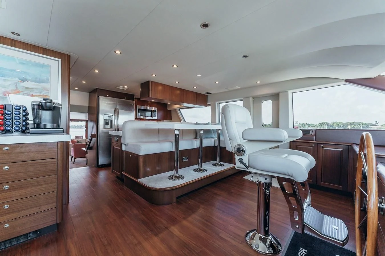 a living room with a wood floor aboard FINAL FINAL Yacht for Sale