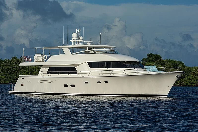 a white yacht on the water aboard FINAL FINAL Yacht for Sale