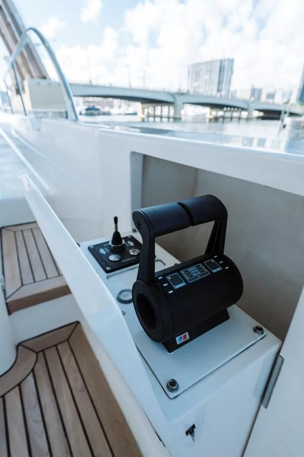 a black telephone on a white dresser aboard FINAL FINAL Yacht for Sale