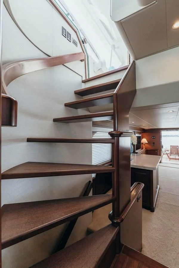 a wooden staircase in a house aboard FINAL FINAL Yacht for Sale