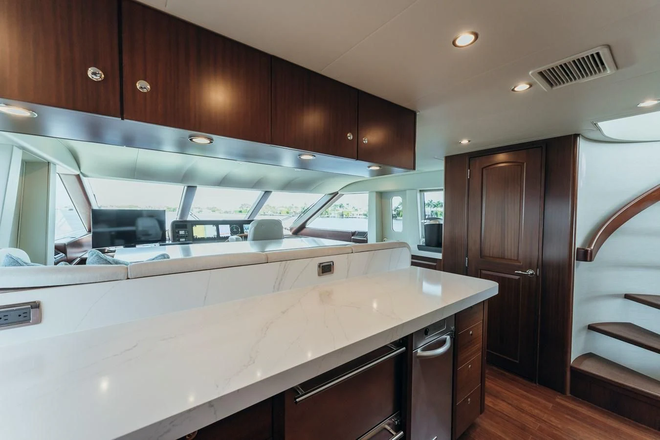 a kitchen with a large island aboard FINAL FINAL Yacht for Sale