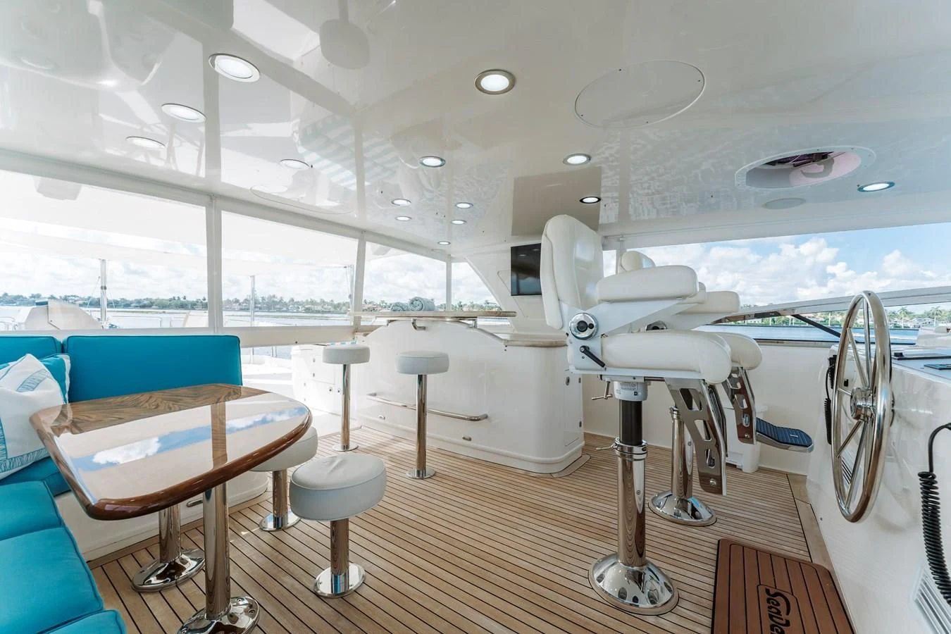 a boat with tables and chairs aboard FINAL FINAL Yacht for Sale