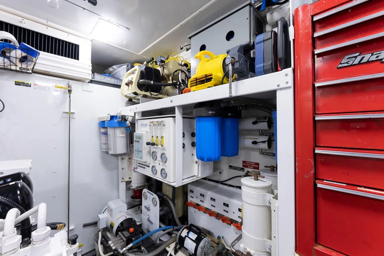 a room with shelves and equipment aboard FINAL FINAL Yacht for Sale