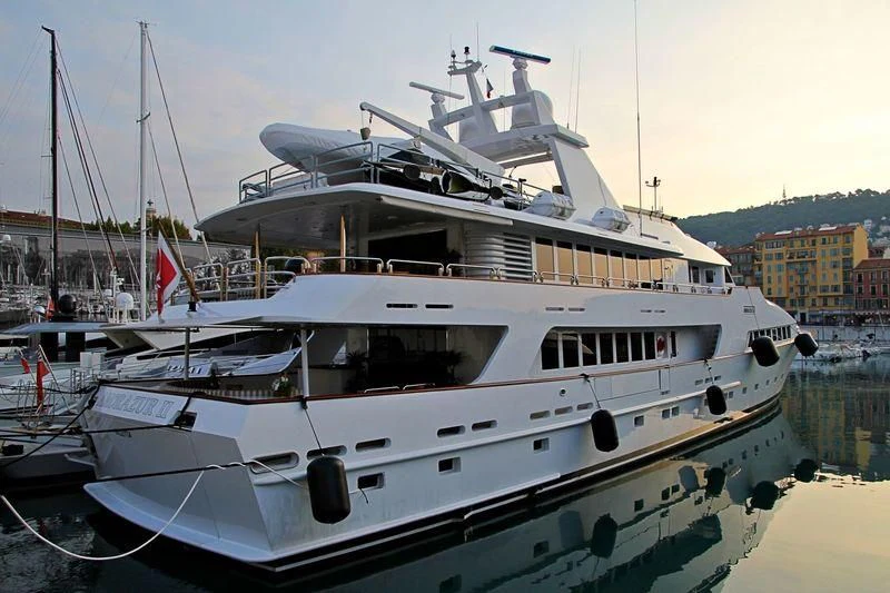 a boat docked in a harbor aboard AMORAZUR II Yacht for Sale