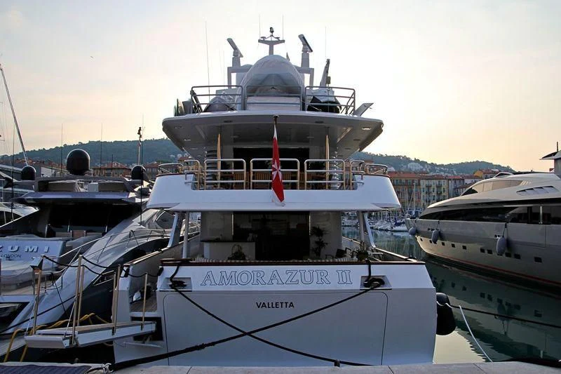 a boat docked at a pier aboard AMORAZUR II Yacht for Sale