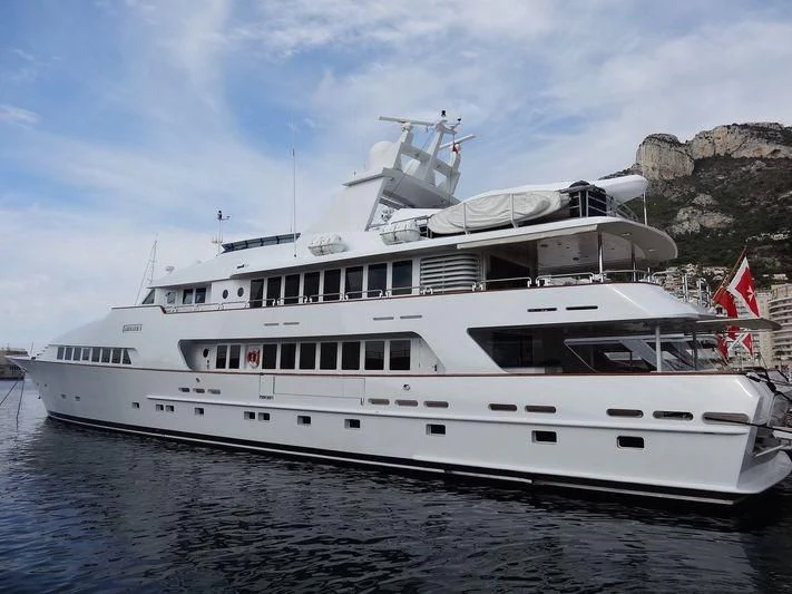 a large white boat on the water aboard AMORAZUR II Yacht for Sale