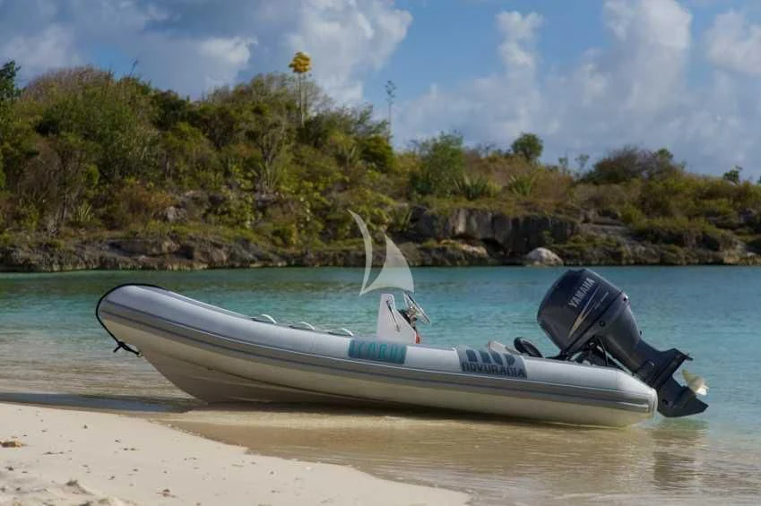 a boat on the beach aboard ICARUS Yacht for Sale