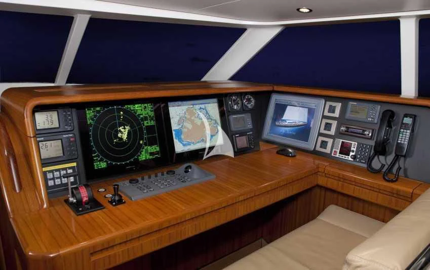 a room with a desk and computer aboard ICARUS Yacht for Sale