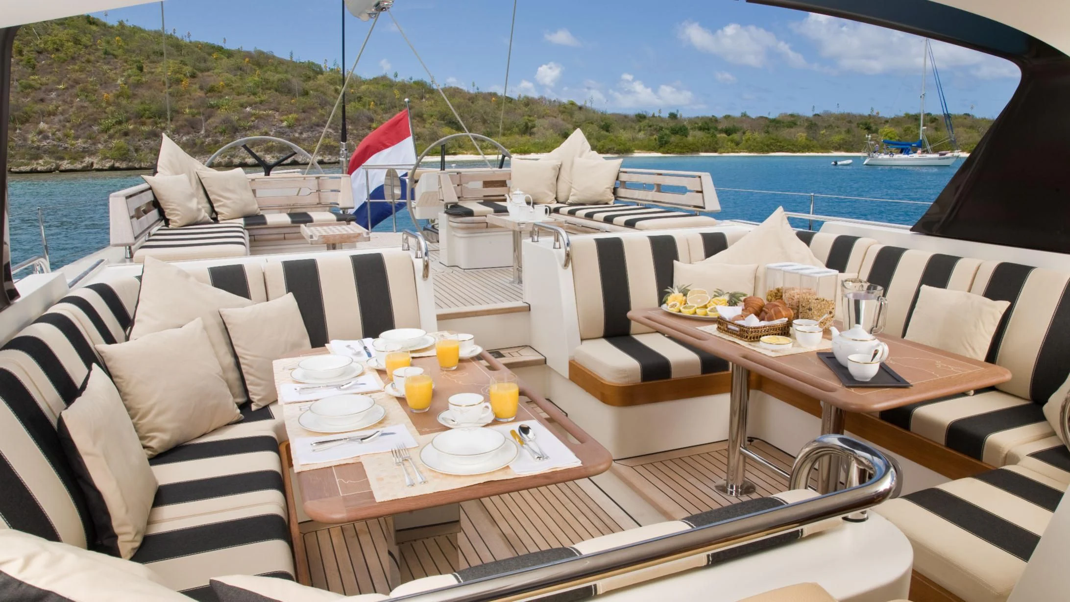 a table with food on it aboard ICARUS Yacht for Sale