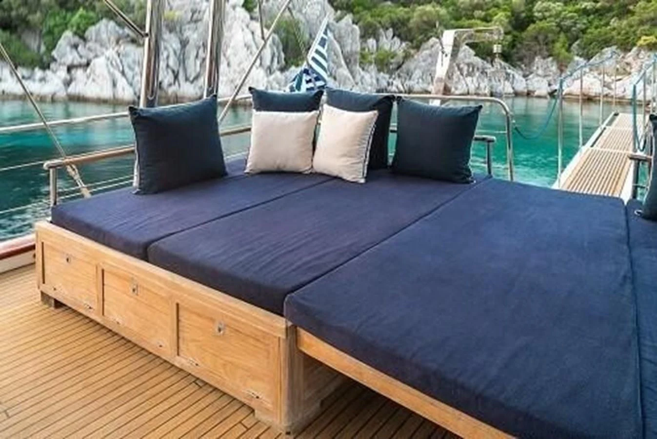 a bed on a deck aboard SEA U SOON Yacht for Sale