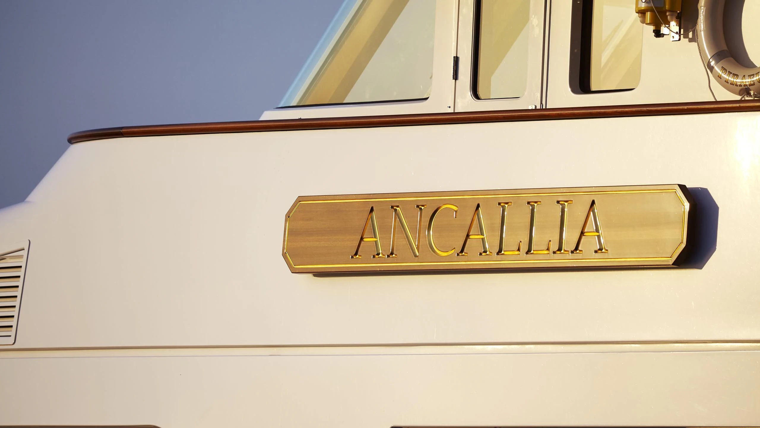 a yellow sign on a white wall aboard ANCALLIA Yacht for Sale