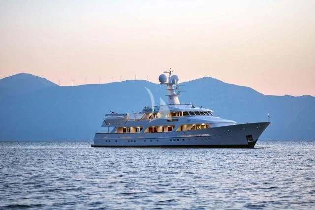 a large white boat in the water aboard ANCALLIA Yacht for Sale
