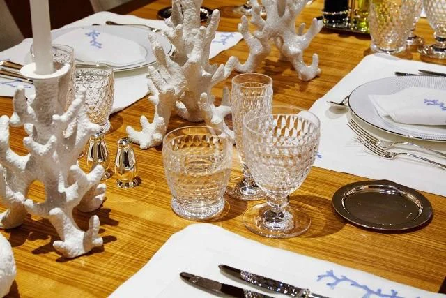 a table with empty glasses and plates aboard ANCALLIA Yacht for Sale