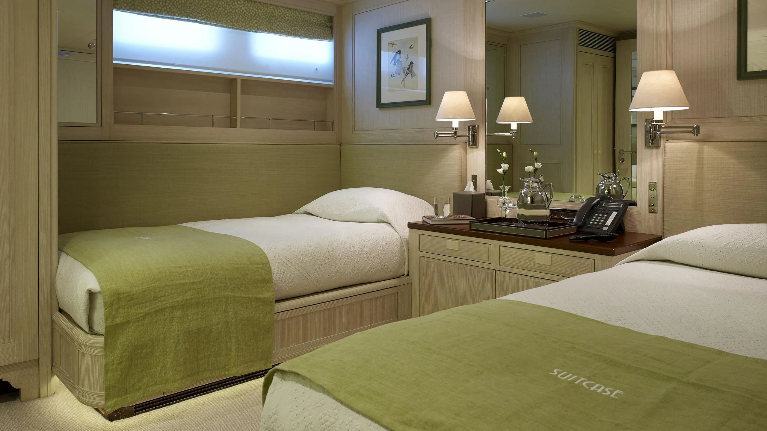 a couple of beds in a hotel room aboard ANCALLIA Yacht for Sale