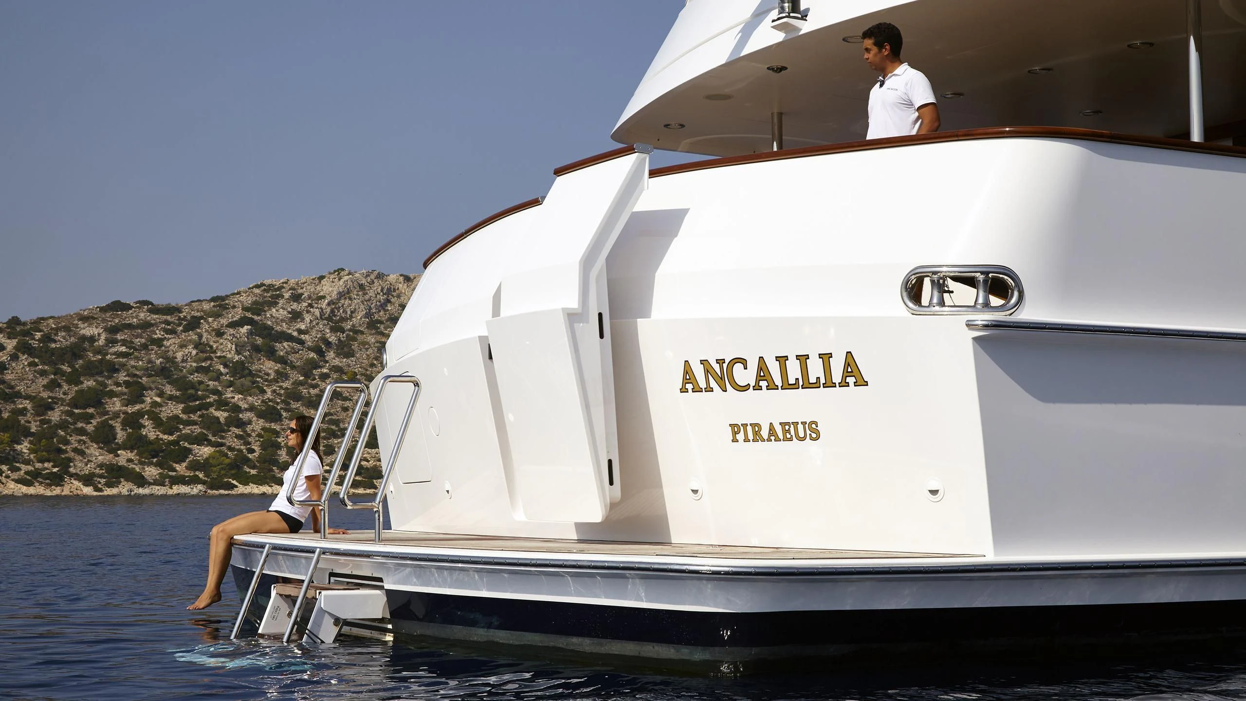 a person sitting on a boat aboard ANCALLIA Yacht for Sale