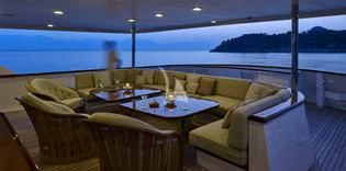 a living room with a large window aboard ANCALLIA Yacht for Sale