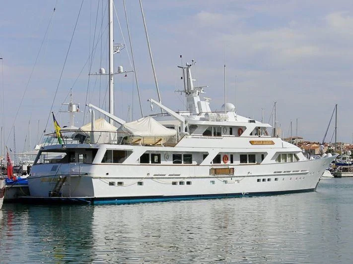 a large white boat in the water aboard ANCALLIA Yacht for Sale