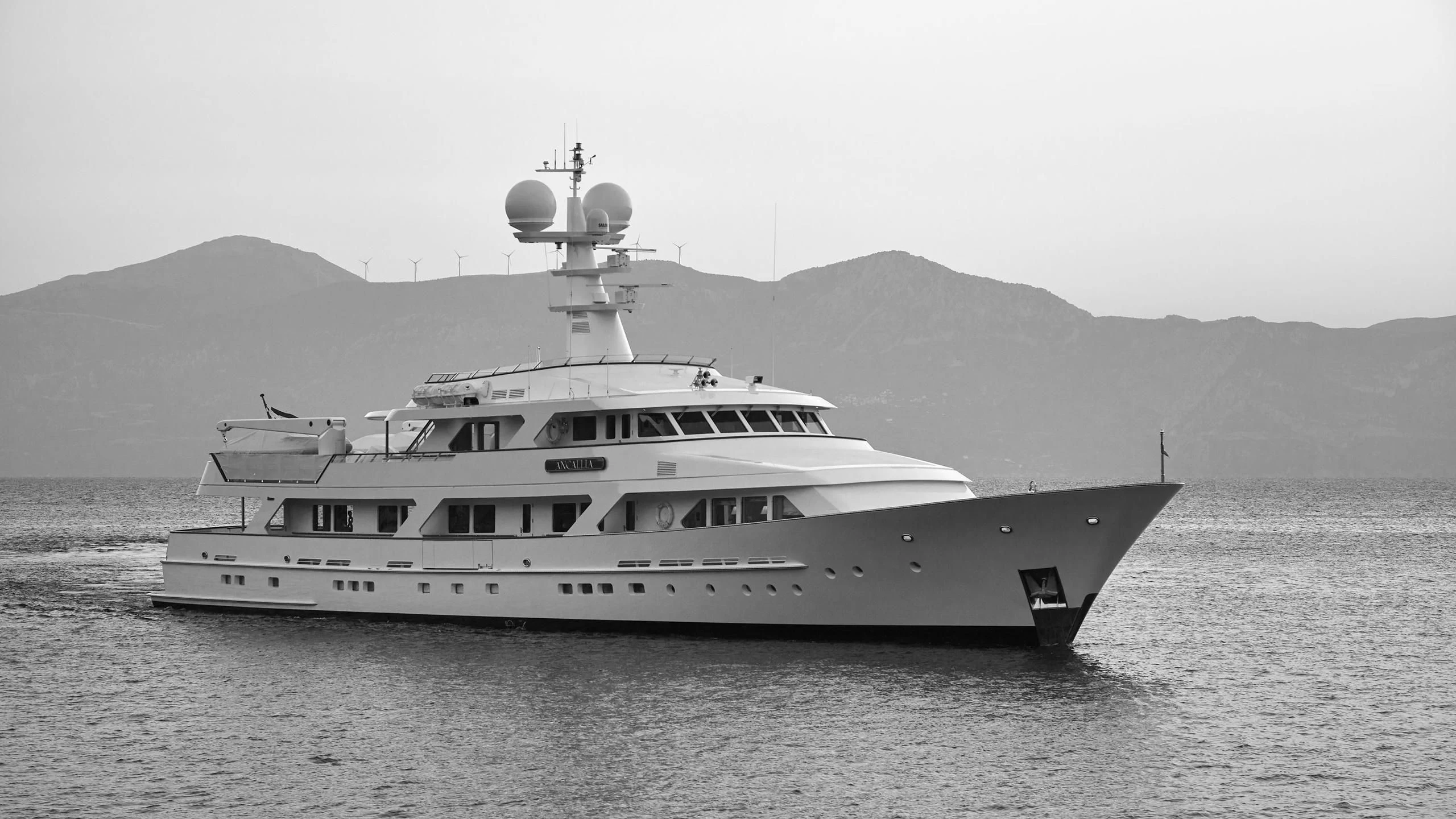 a large white boat aboard ANCALLIA Yacht for Sale