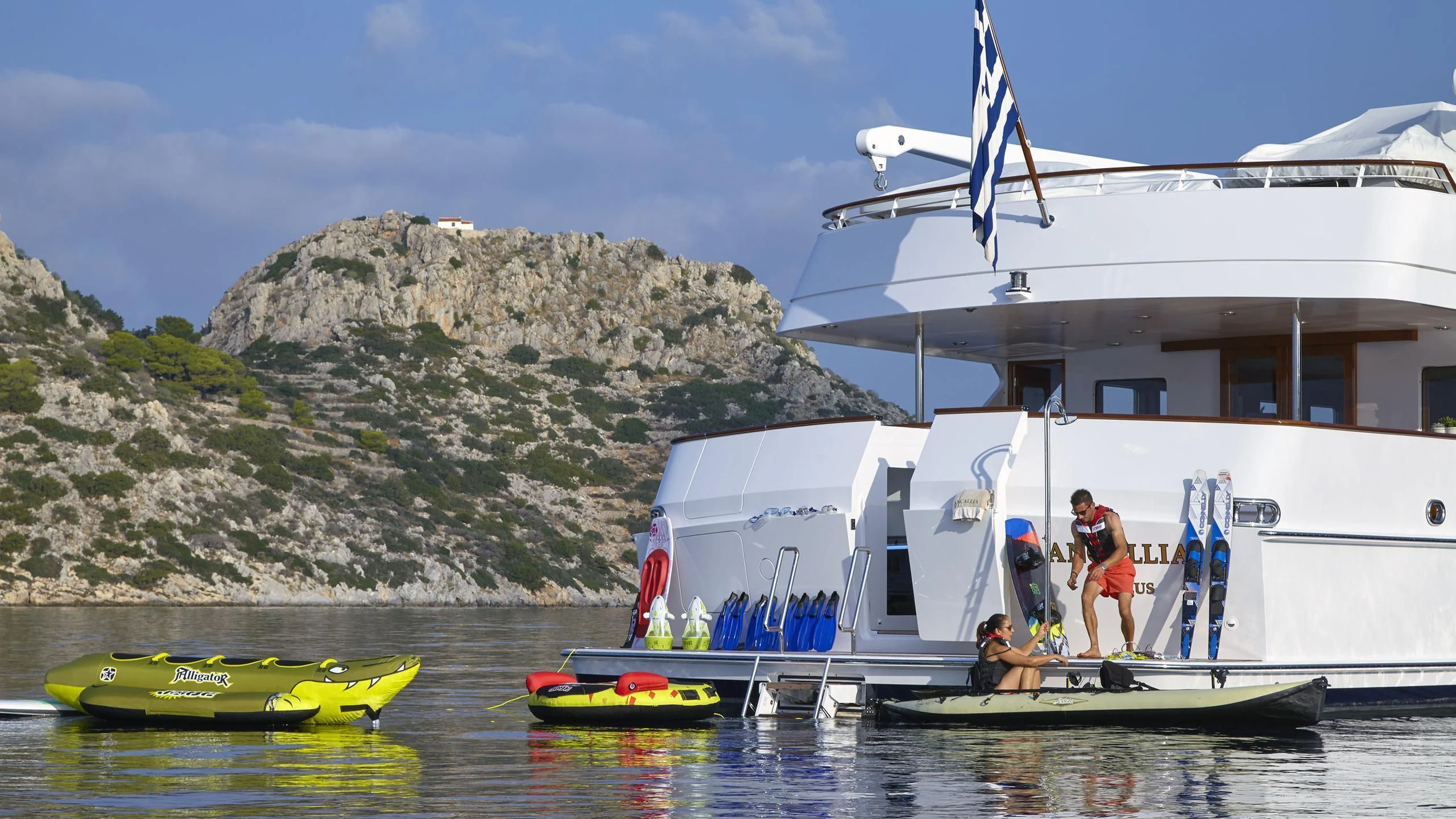 a group of people on a boat aboard ANCALLIA Yacht for Sale
