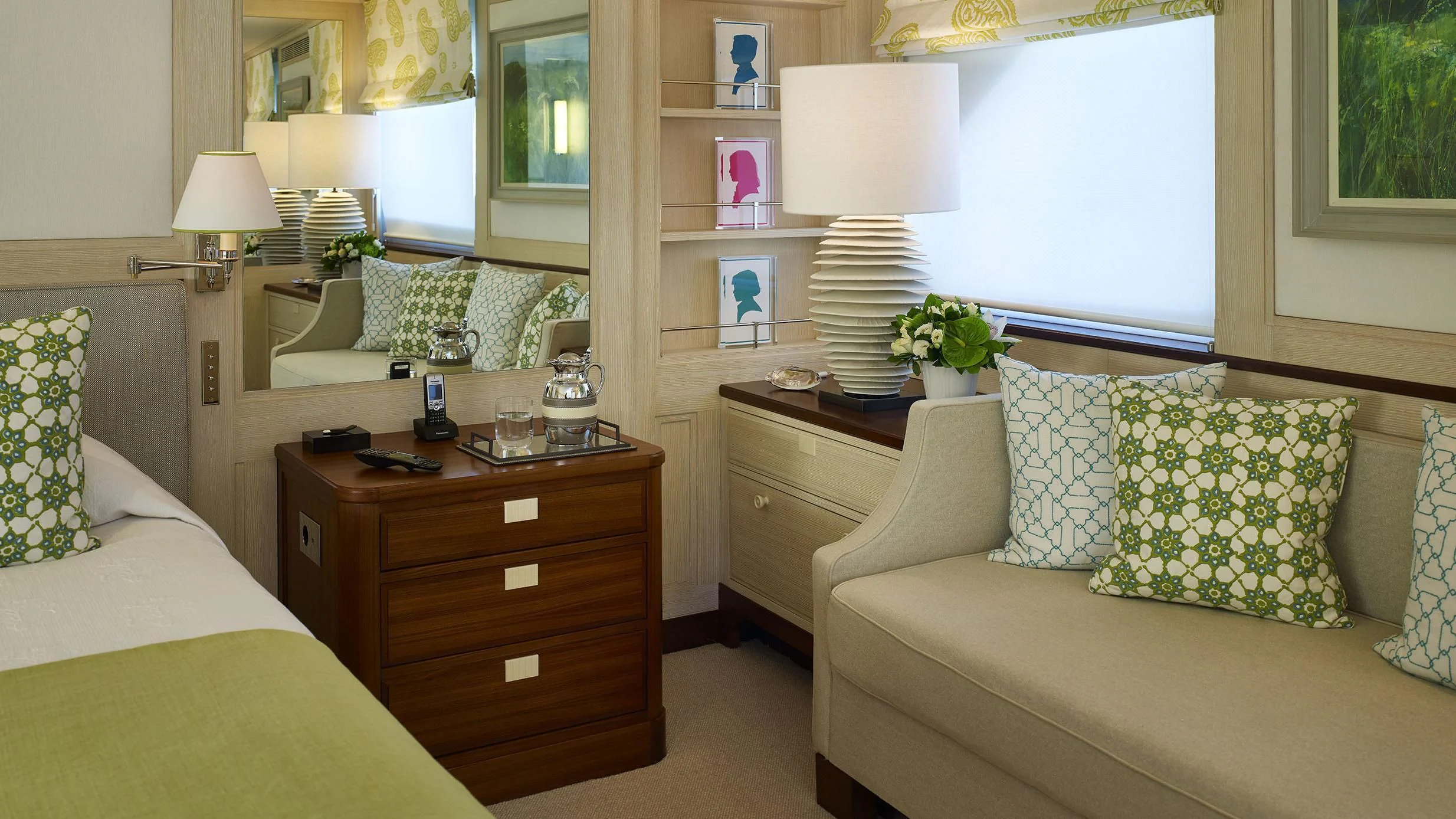 a room with a bed and a desk aboard ANCALLIA Yacht for Sale