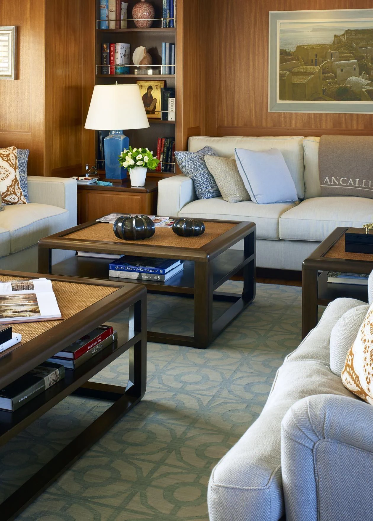 a living room with a coffee table and a couch aboard ANCALLIA Yacht for Sale