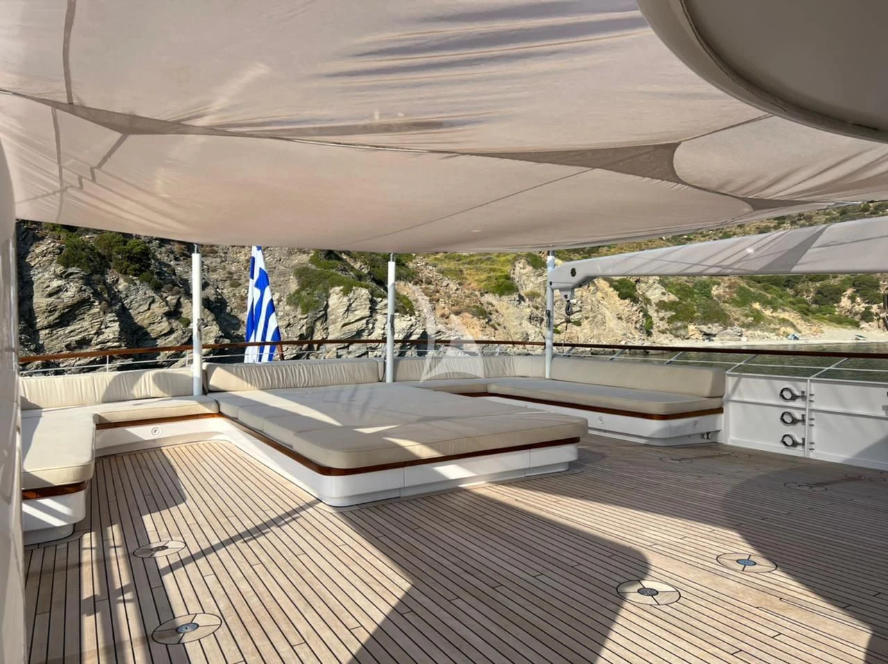 a large white tent with a flag on it aboard ANCALLIA Yacht for Sale