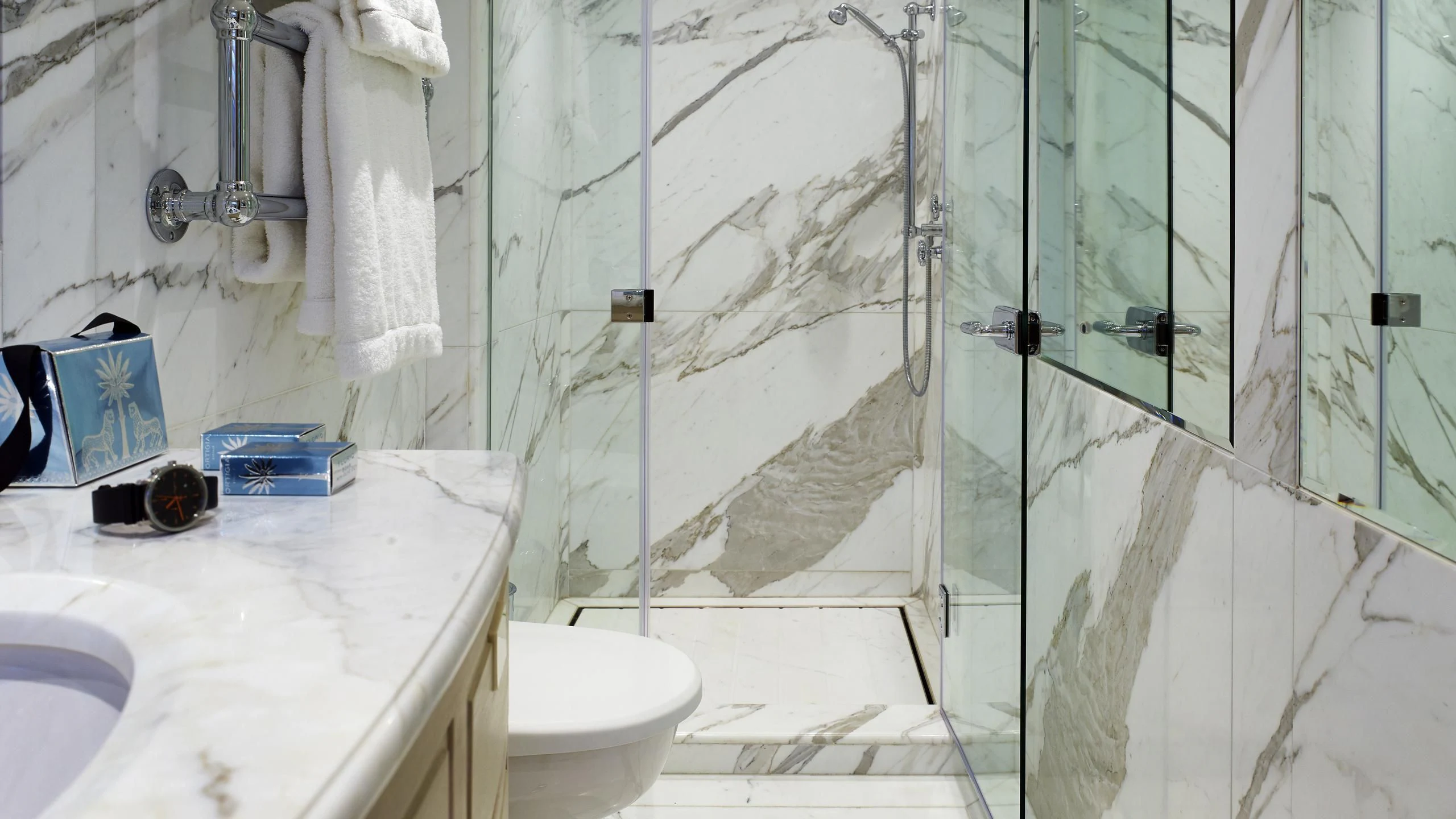 a bathroom with a shower curtain aboard ANCALLIA Yacht for Sale