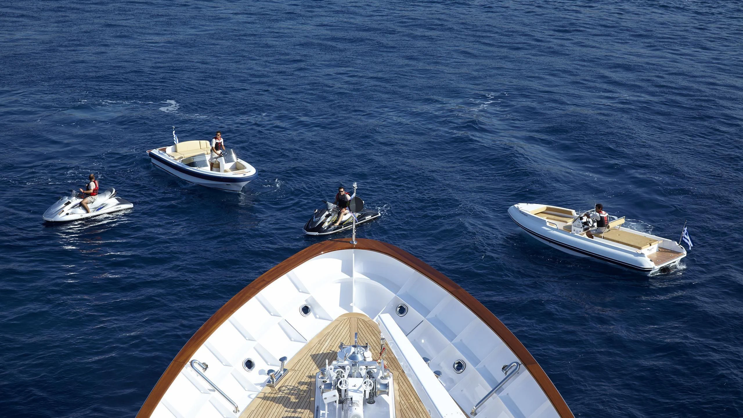 a group of people on a boat aboard ANCALLIA Yacht for Sale