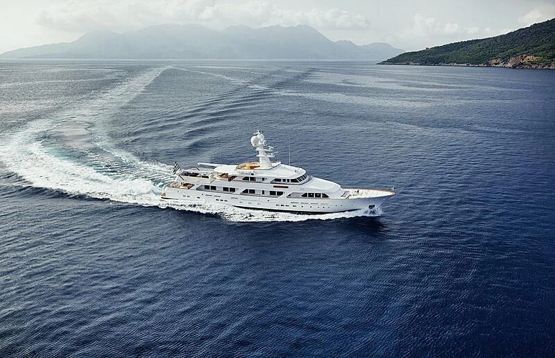 a white boat in the water aboard ANCALLIA Yacht for Sale