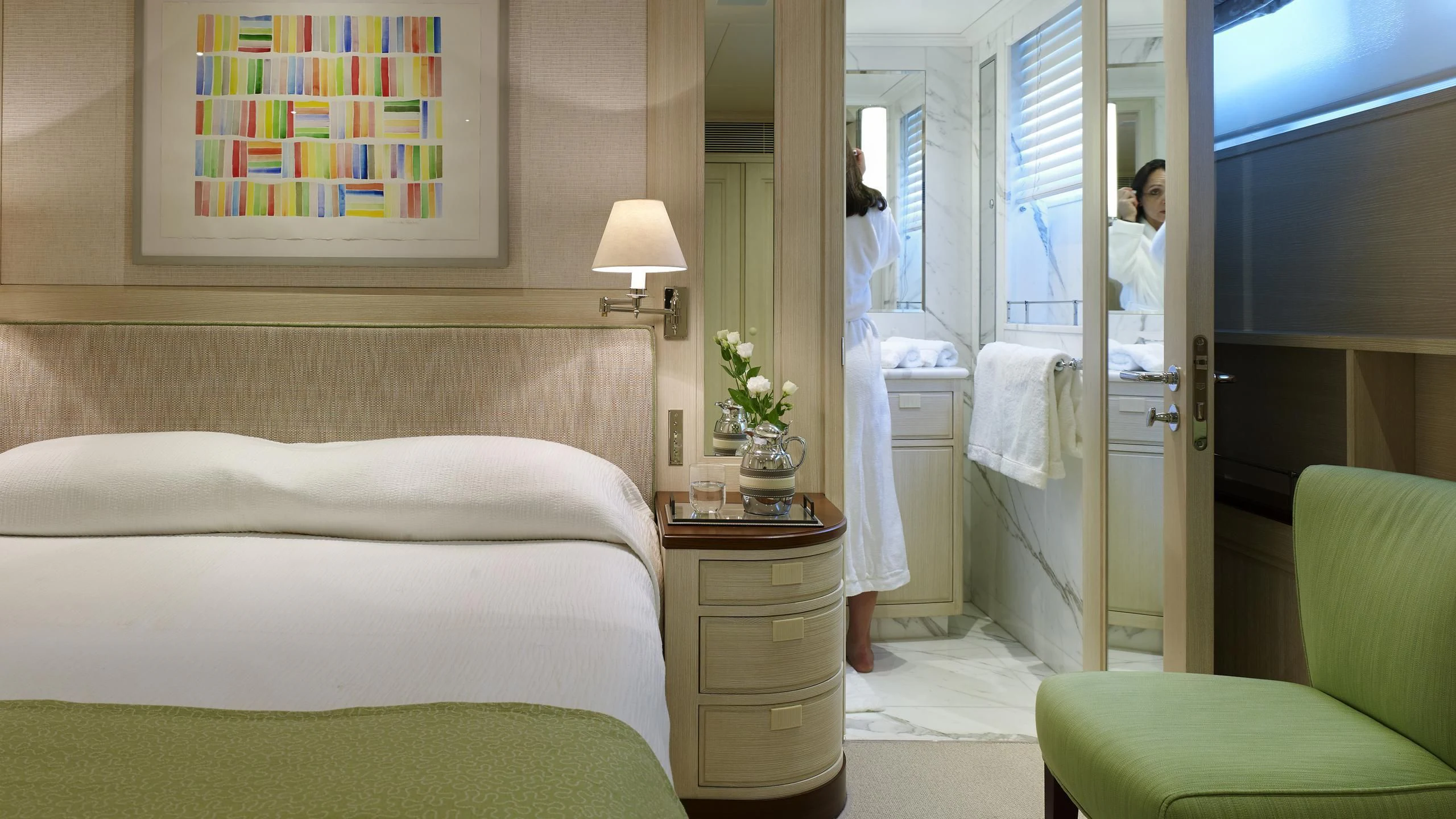 a person in a hotel room aboard ANCALLIA Yacht for Sale