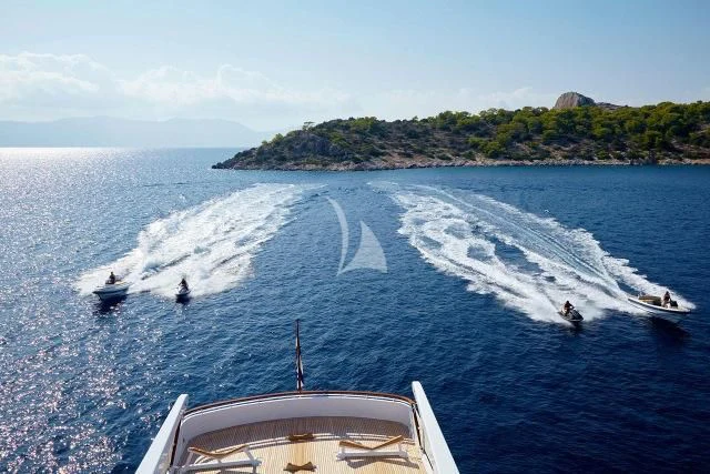 a boat is moving on the water aboard ANCALLIA Yacht for Sale