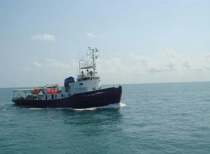 a boat in the water aboard FLAMINGO BAY Yacht for Sale