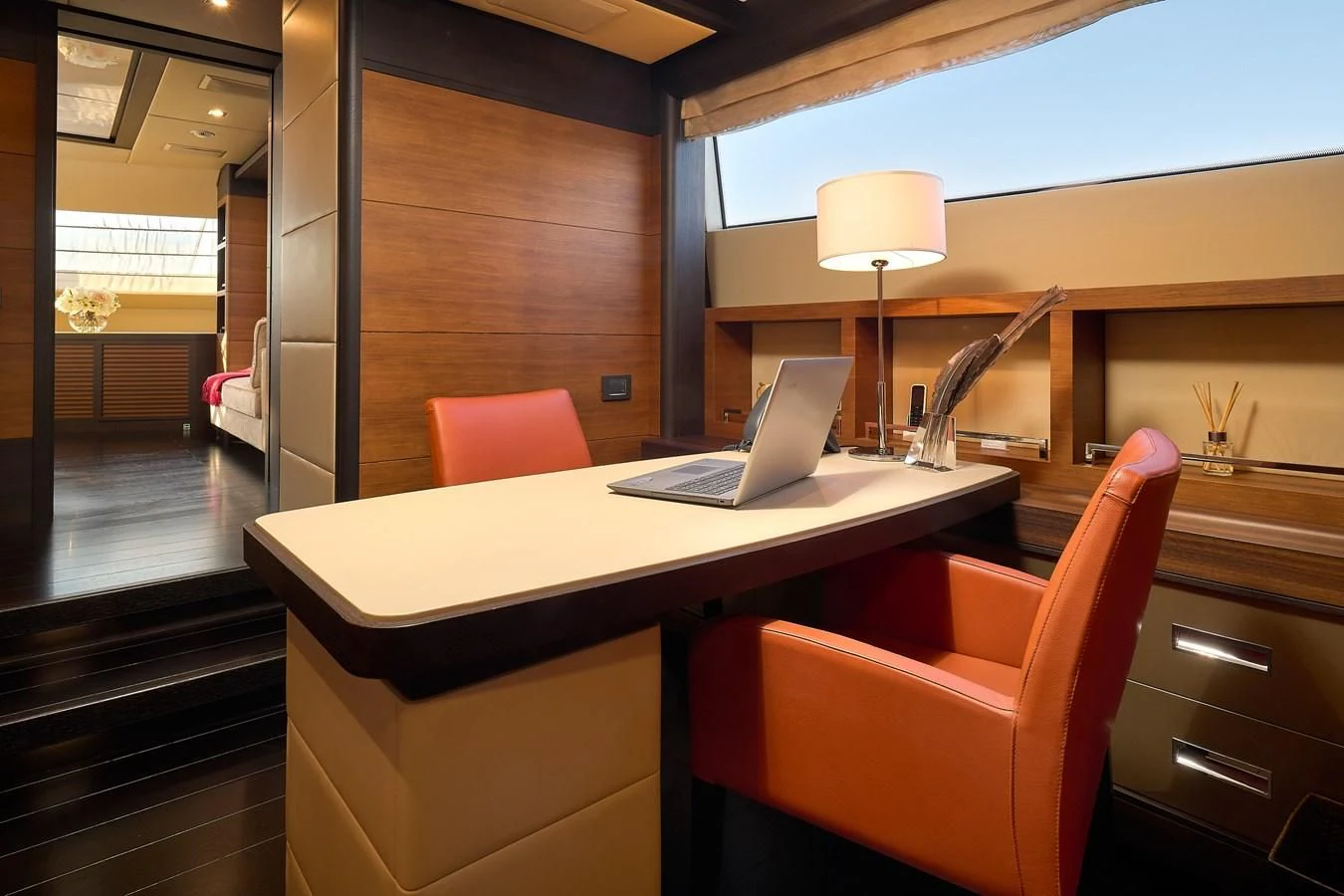 a laptop on a table aboard LADY MRD Yacht for Charter